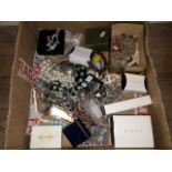 A box of costume jewellery.