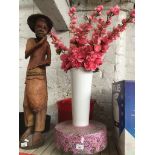 A large oriental flower vase with artificial flowers