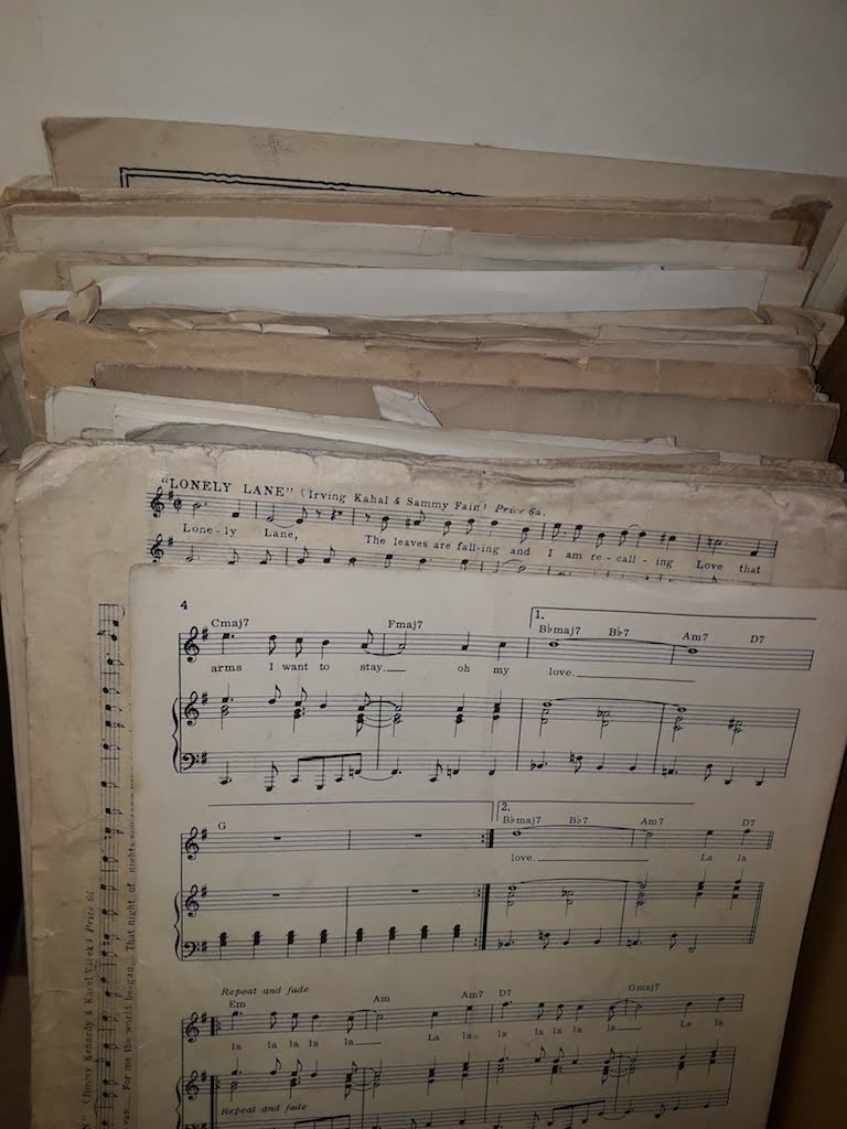 A box of sheet music.