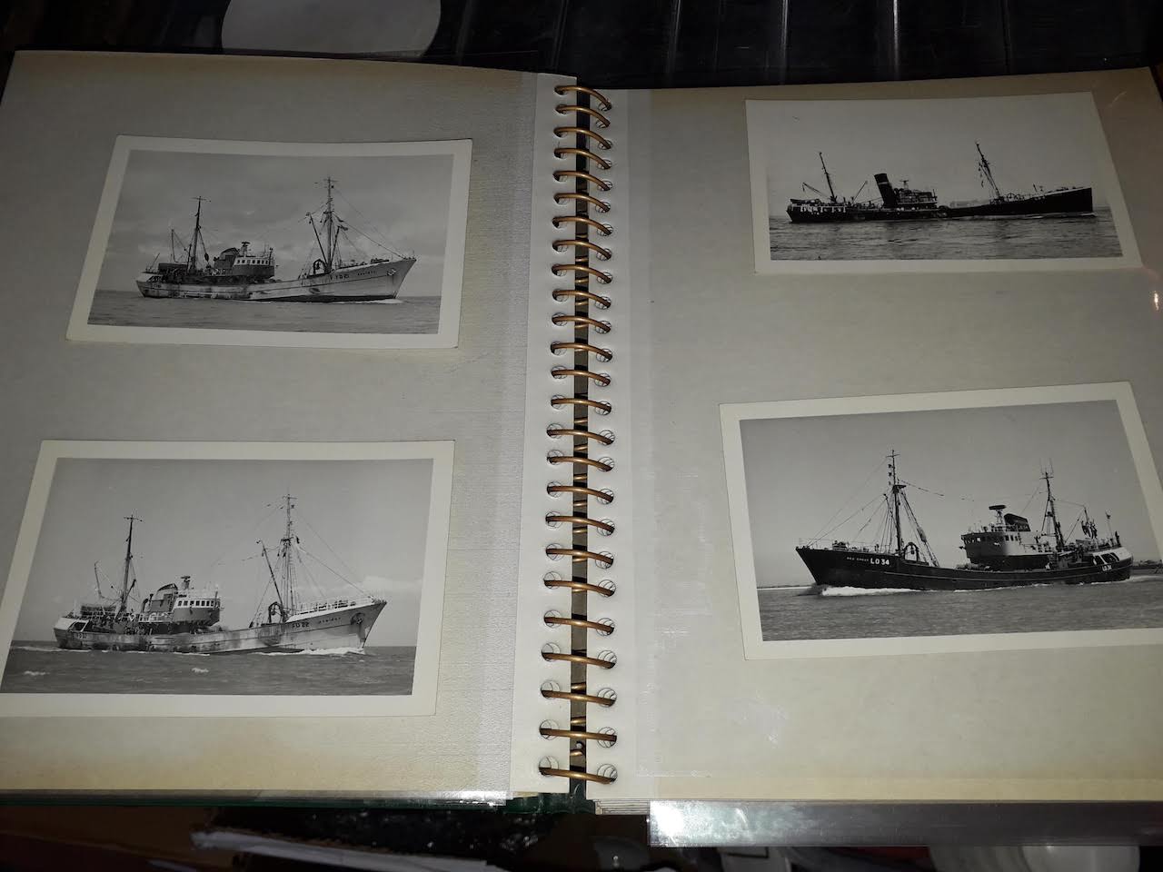 An album of maritime photographs, mainly fishing trawlers, approx. 80, the majority stamped "Peter