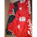 Six various Liverpool football shirts and a baseball cap