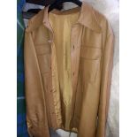 A tan vintage leather jacket - size tab 52