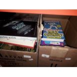 Two boxes of books including children's, dog training etc.