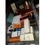 A box of vintage and modern perfumes including Chanel, Christian Dior etc.