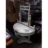 A white painted Victorian demi lune dressing table.