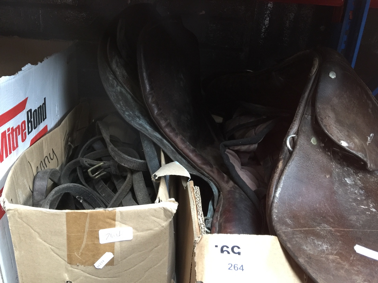 2 boxes of horse tack including saddle