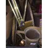 A crate of brassware