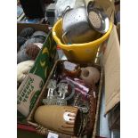 A basket and a bucket containing bric-a-brac