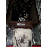 A box of vintage costume jewellery.