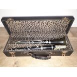 A Buisson clarinet in case.