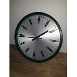 A military wall clock designed by Robert Welch, (movement replaced), diam. 34cm.