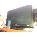 A Panasonic 41" DV3 TV with remote.