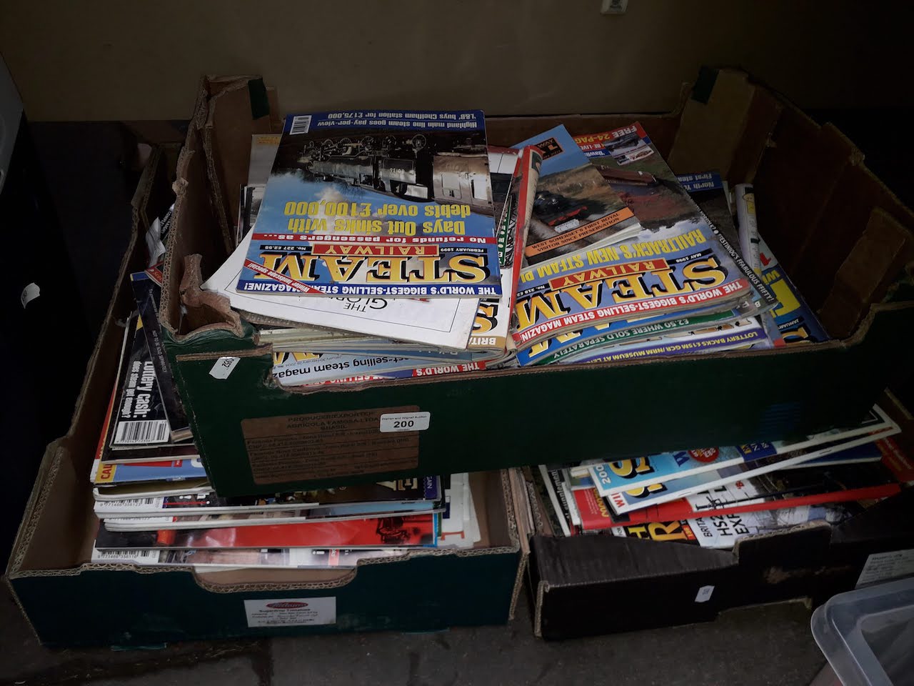 Three boxes of railway related magazines