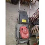 A Honda petrol lawn mower.