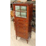 An Edwardian inlaid and cross banded mahogany music cabinet with upper glazed compartment above