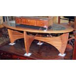 A G-Plan Astro teak and glass top coffee table of oval form.