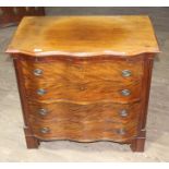 A Georgian style mahogany bachelor's chest circa 1900, serpentine front with brass handles below a