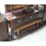 A Victorian stained pine dresser base having three drawers raised on turned legs, height 75cm, width