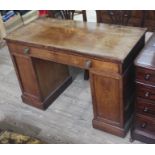 A George III Regency period mahogany knee hole desk with single frieze drawer having brass knobs and