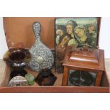 A suit case and contents including a Smiths mantle clock, a print on board, an embossed mirror, a