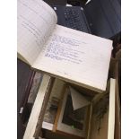 A box containing nautical pictures and a log book from the Port of Preston relating to the dredger
