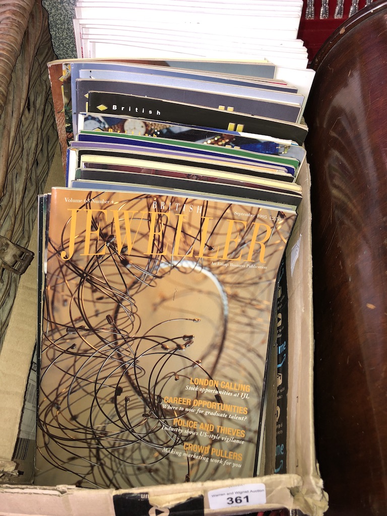 A box of jewellers magazines and Cunard souvenir magazines