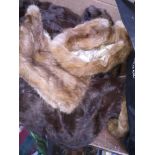 A small collection of various small fur items including stole and hat