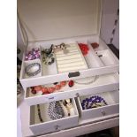 Costume jewellery in a cabinet