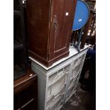 A Victorian pine pot cupboard and a glazed bookcase