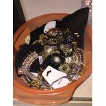 A tub of costume jewellery