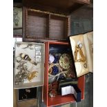 Costume jewellery and a wooden box