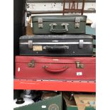 3 vintage suitcases