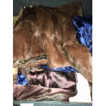 An Antler suitcase containing ladies brown fur jacket, fur stole, and various other vintage clothing