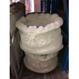 Two pairs of concrete planters inc sack style