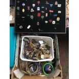 Box of costume jewellery, tub of watches and a tray of badges