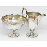 A hallmarked silver pedestal sugar bowl and matching cream jug, weight 4 1/2oz. Condition - marks