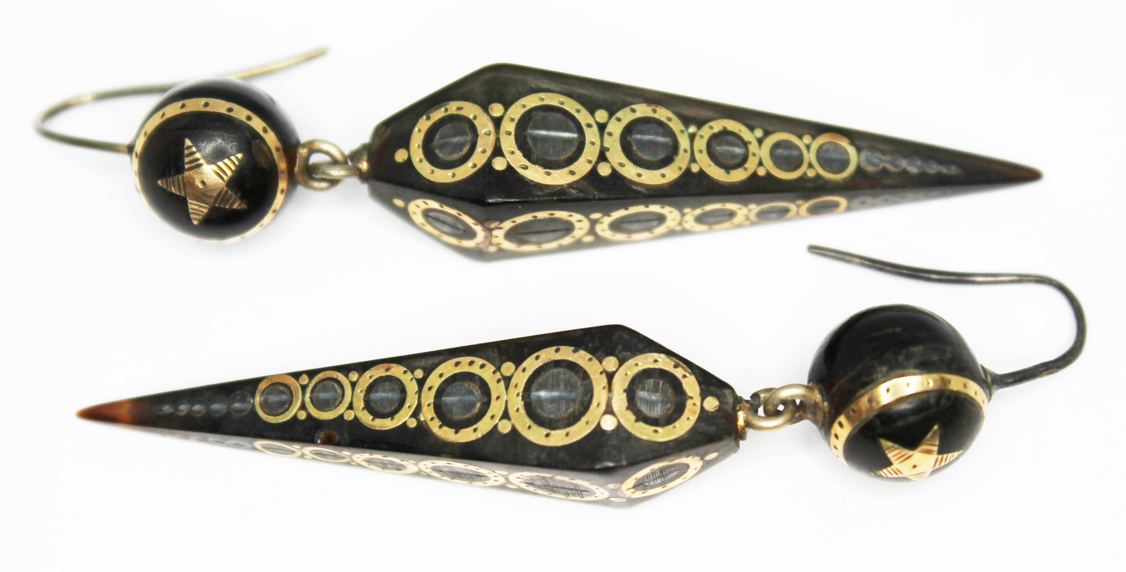 A pair of Victorian pique inlaid tortoiseshell drop earrings, length 52mm each. Condition - good, no