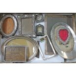 A box containing ten hallmarked silver photograph frames, various lengths, 4cm to 19cm.