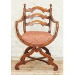 A reproduction X-frame walnut armchair circa 1900, width 57cm, depth 49cm & height 87cm.