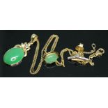 A hallmarked 14ct gold jade cabochon and diamond pendant on 14ct gold chain, together with a similar