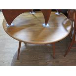 An Ercol blode elm drop leaf table. Condition - good, general wear, minor marks and scratches etc.