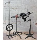 A group of three early 20th century dentist's tools/appliances comprising a treadle drill, a gas