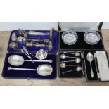 Assorted hallmarked silver comprising three candlesticks, a cased spoon, together with various