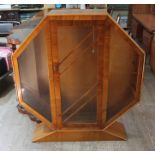 An Art Deco walnut display cabinet of octagonal form, width 114cm, depth 28cm & height 127.5cm.