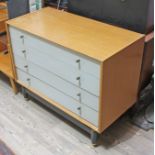 A G-Plan light oak and painted chest of drawers with black base, width 96cm, depth 47cm & height
