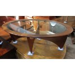 A G-Plan "Astro" teak and glass oval coffee table.