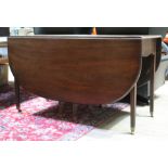 A large George III mahogany Pembroke table, min. length 137cm, max. length 162cm, depth 56cm &