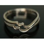 A combination ring of wavy form, both marked '18ct', gross weight 2.93g, size O. Condition - good,