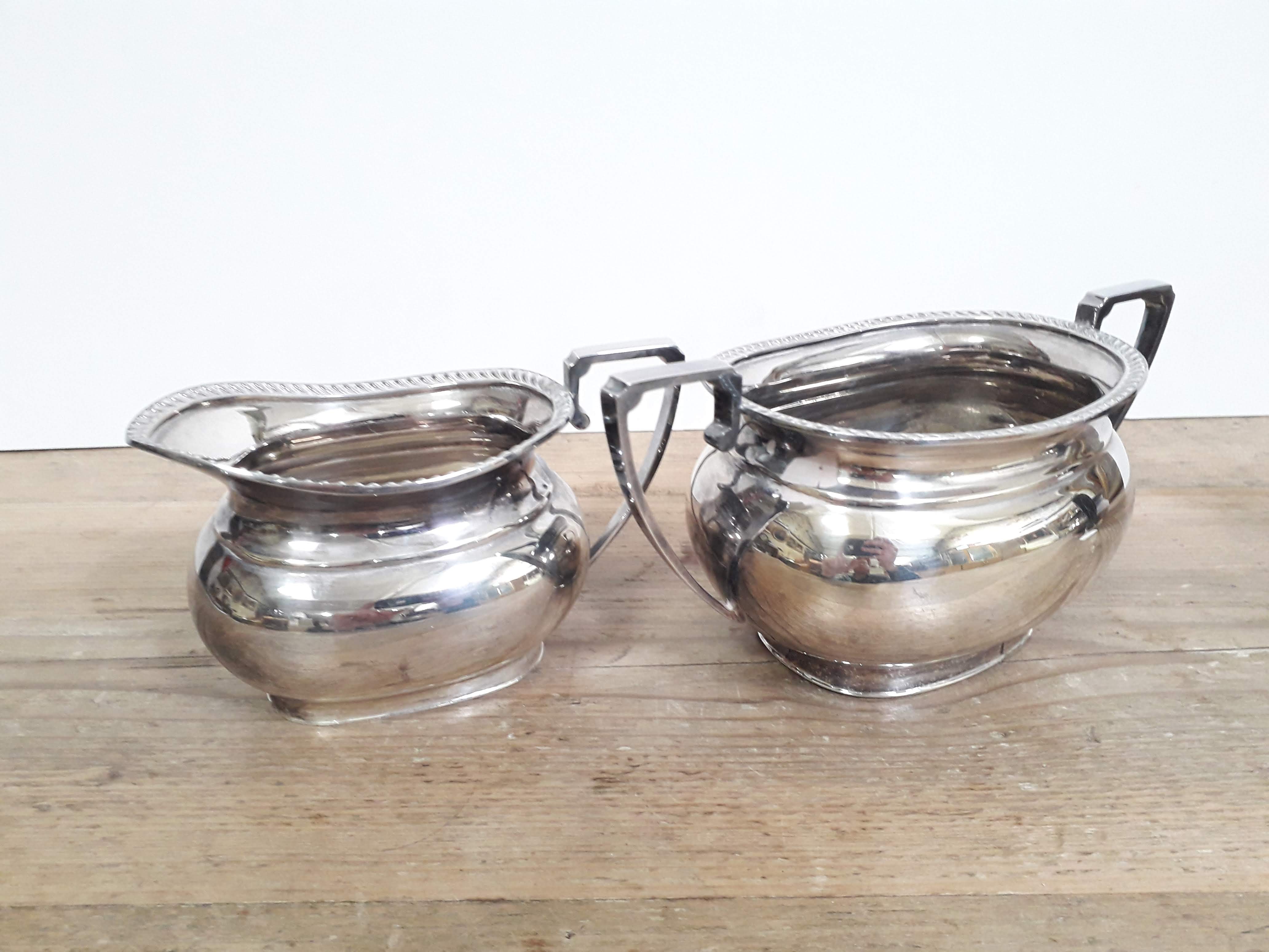 A three piece hallmarked silver tea set, gross weight 43oz. - Bild 6 aus 7