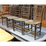 A set of four Morris & Co Sussex chairs.